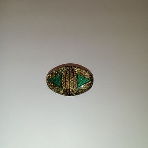 Vintage oval Gold and blue resin Art Deco Style pin.